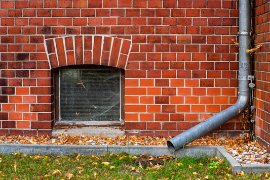 A section of a brick wall with a water resistant protective coating applied to the surface.