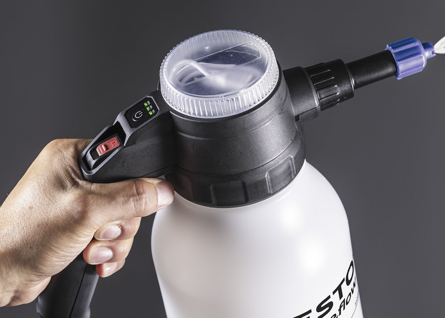 spraying foam cleaning chemicals