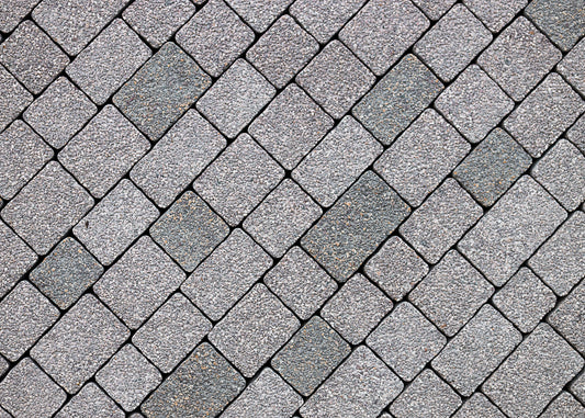 stone blocks used on a driveway that are clean and free from moss and lichen growth. Batifast will keep surfaces free of moss growth and the signs of lichen.