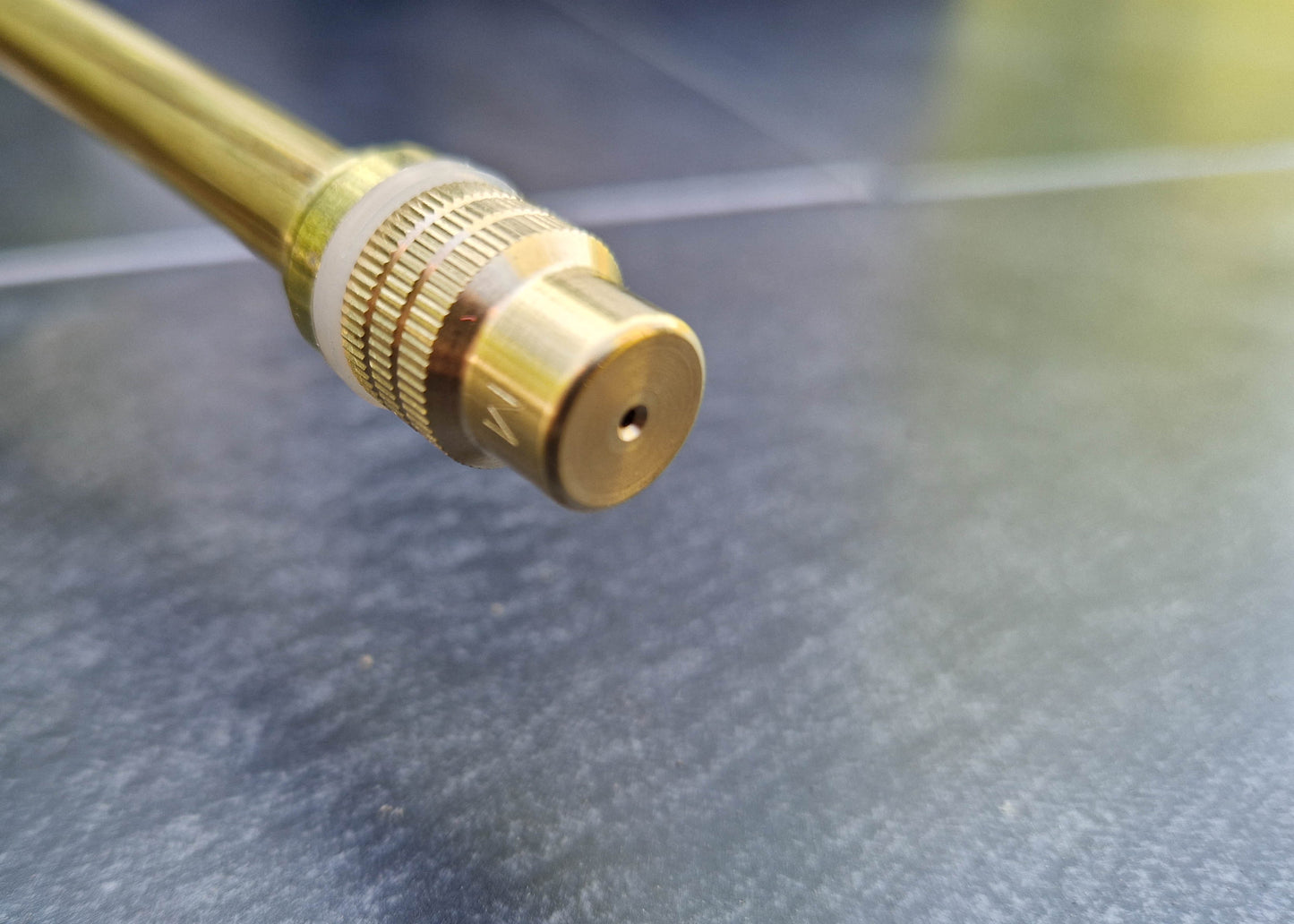 photo showing a close up of the hollow cone, brass nozzle that is supplied as standard for our 12 litre garden backpack sprayer