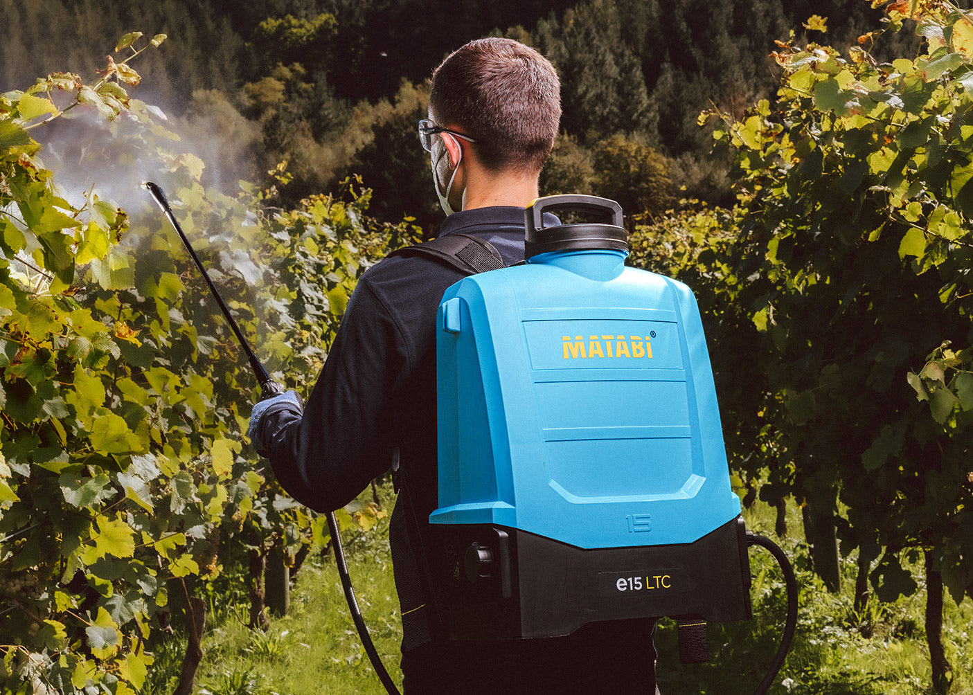 15 litre electric backpack sprayer being used to spray crops