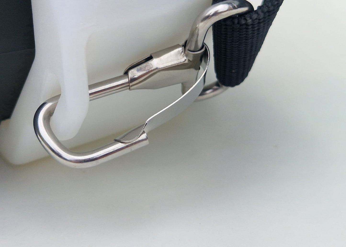 photo showing the stainless steel clip for the shoulder straps on our battery powered IK chemical sprayer