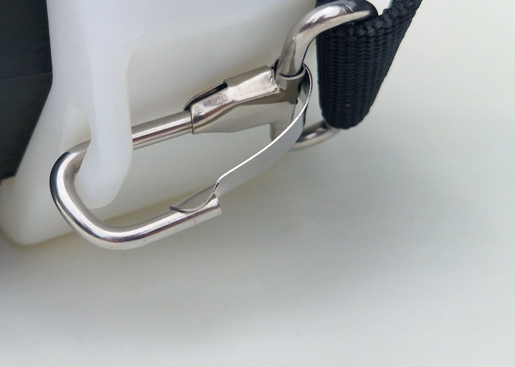 photo showing the stainless steel clip for the shoulder straps on our battery powered IK chemical sprayer